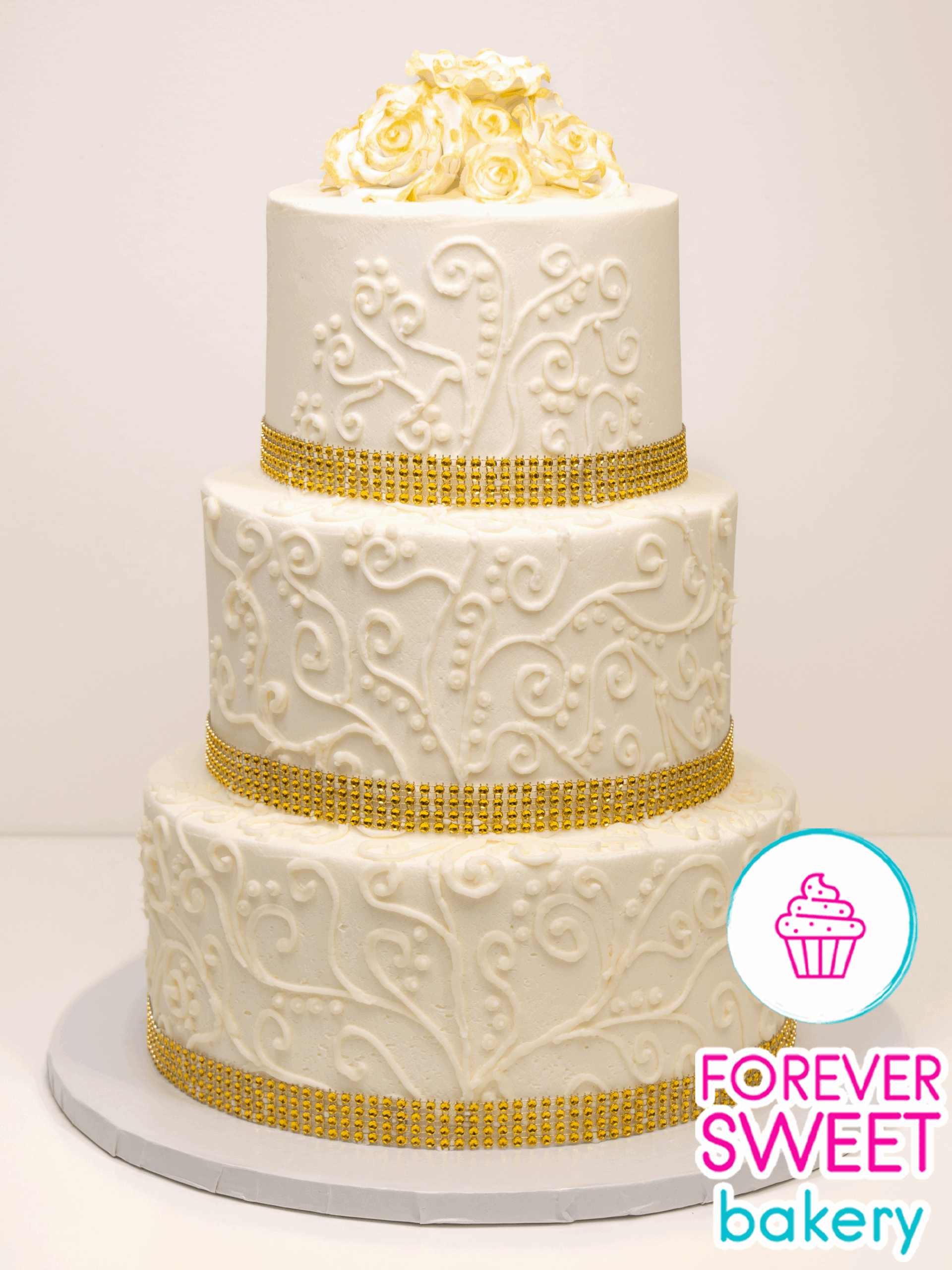 3-Tier-Wedding-Cake-with-White-and-Gold-Painted-Flowers-and-BC-Scrollwork-FSB